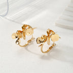 Ladies Creoles with artistic floral ornament