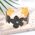 Ladies' bangle with floral motifs