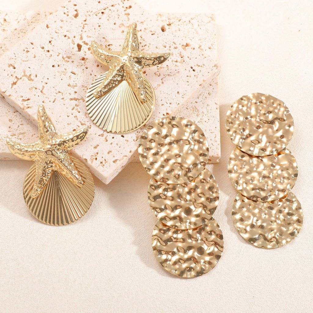 Women's ear clips in luxurious shell and starfish design