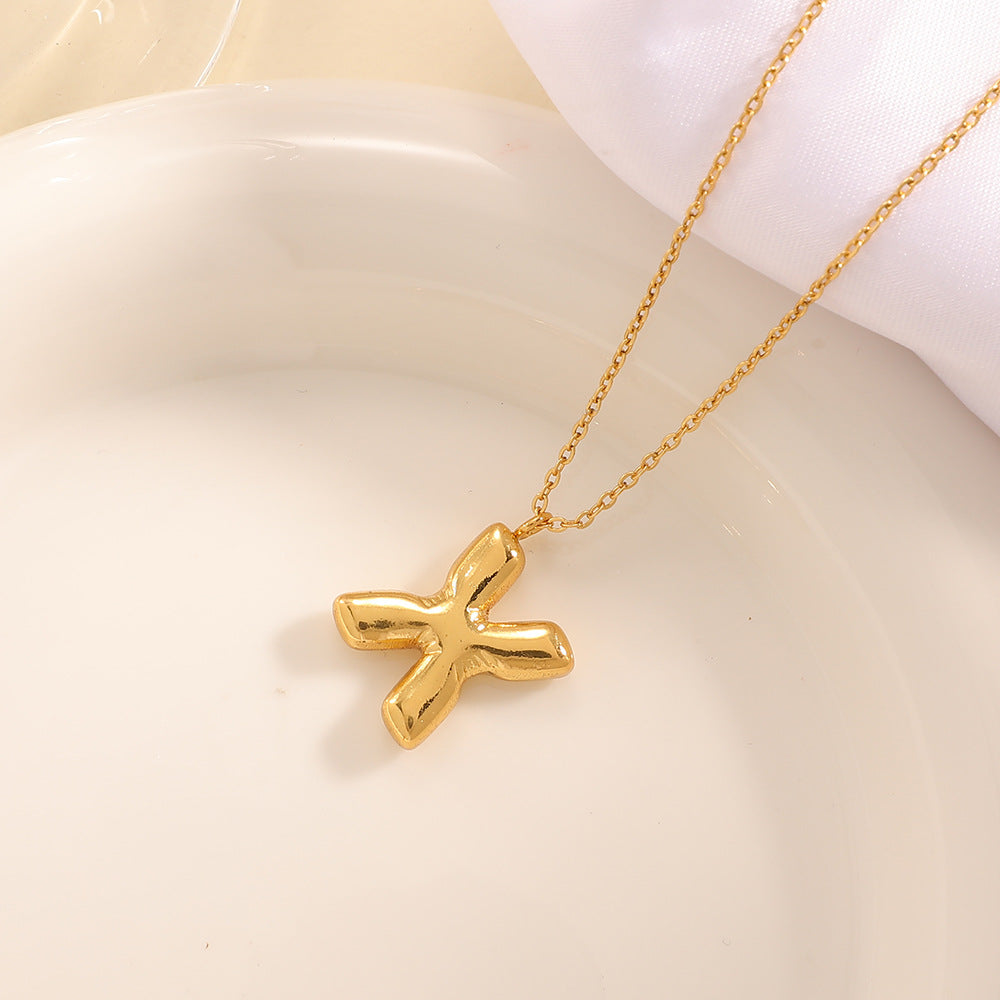 Women's necklace with curved letter pendant