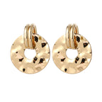 Women's elegant earrings with rustic, folded design