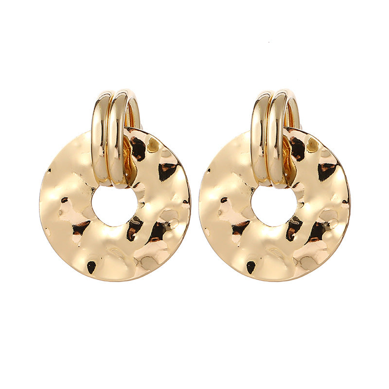 Women's elegant earrings with rustic, folded design