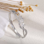 Ladies bracelet with elaborate infinity symbol and sparkling zirconia