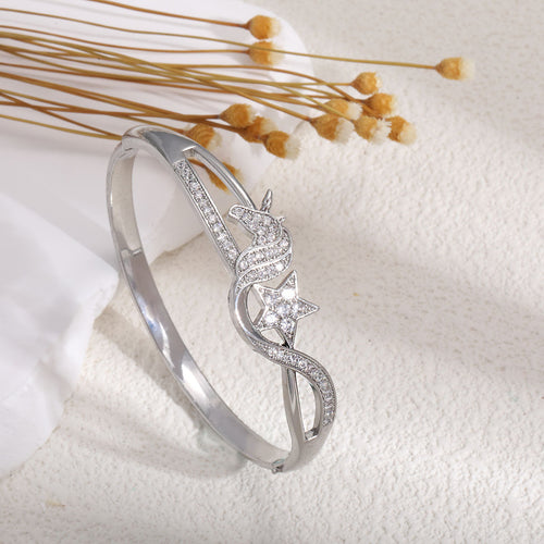 Ladies bracelet with elaborate infinity symbol and sparkling zirconia