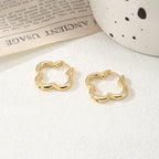 Ladies hoops in unique, sculptural design