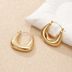 Ladies earrings in a modern, curved design
