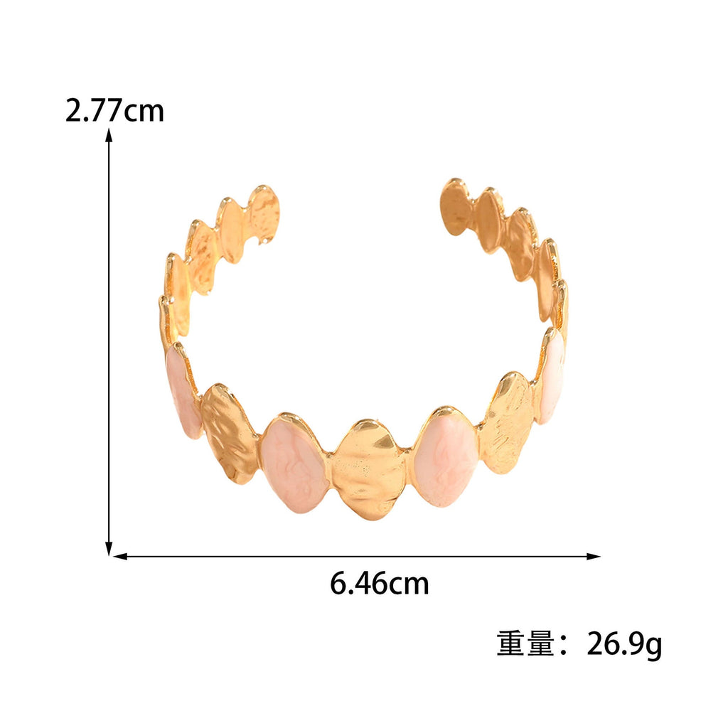 Ladies Open Bangle made of noble metal with elegant motif