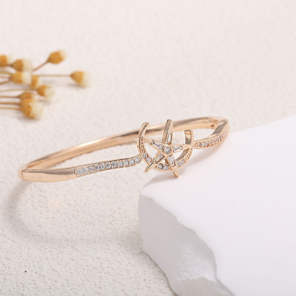 Women's bangle with elegant infinity pattern and sparkling zirconia