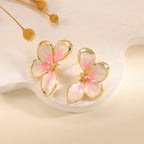 Women's ear clips in elegant floral design with a glossy coating