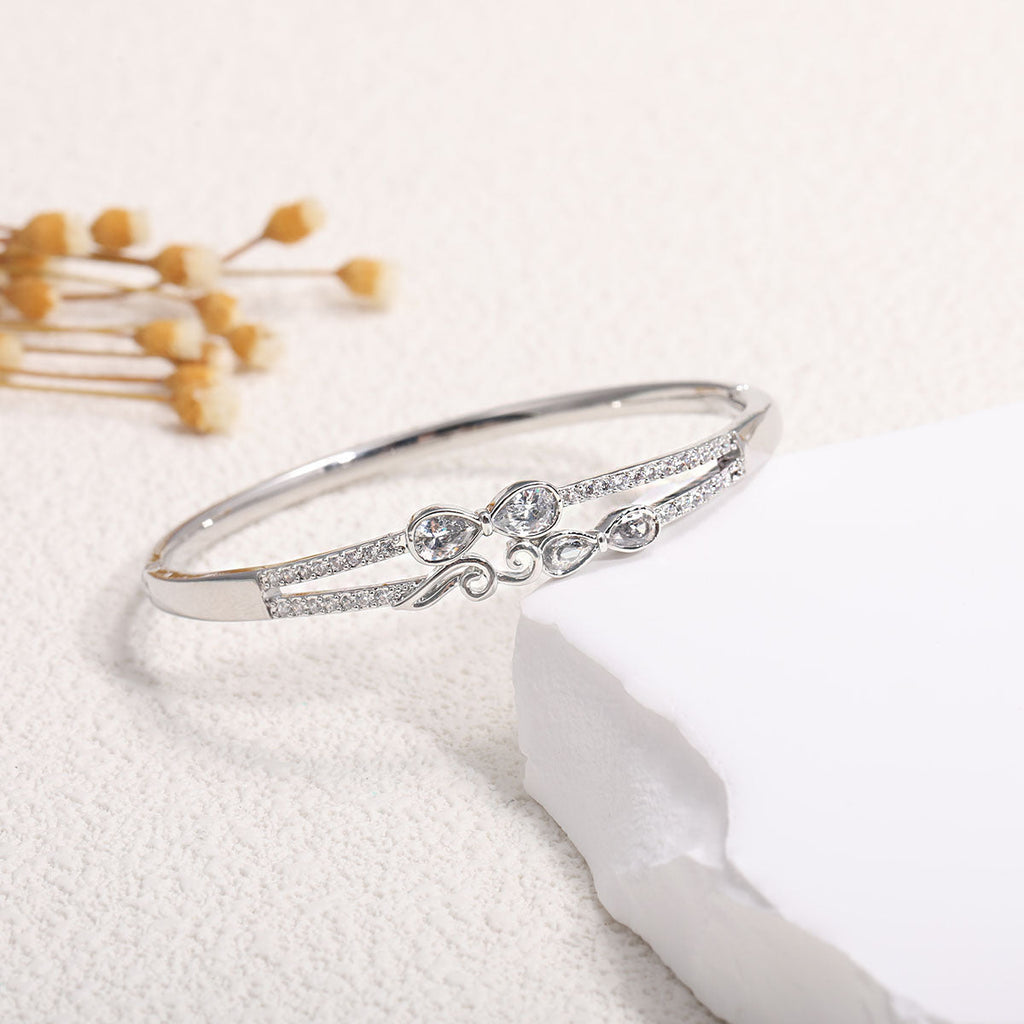 Ladies bracelet with elaborate infinity symbol and sparkling zirconia