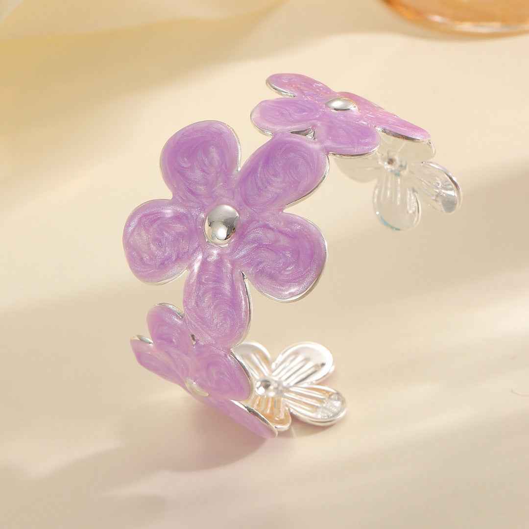 Women's bracelet made of high-quality metal with floral design