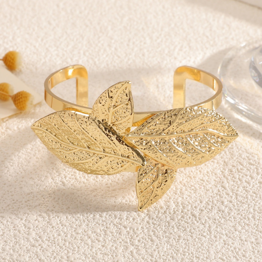 Ladies' bangle with artistic leaf design