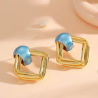 Women modern earrings with asymmetrical design