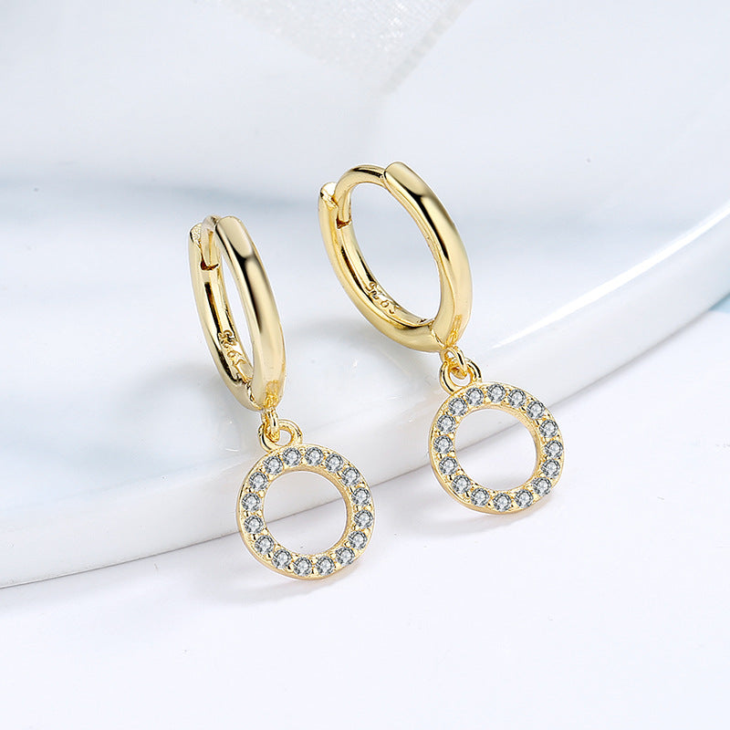 Women's earrings with sparkling circle pendant