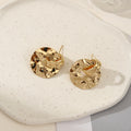 Women's elegant earrings with rustic, folded design