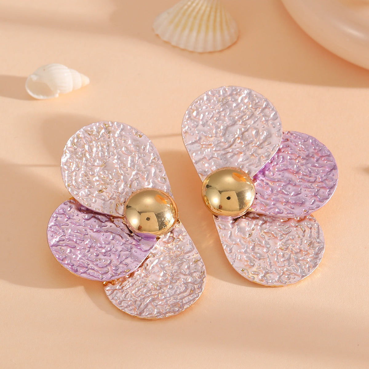 Women's ear clips in elaborate floral pattern