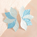 Women’s hair accessory with elaborate leaf design