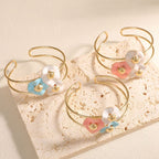 Women's bangle with elaborate floral design