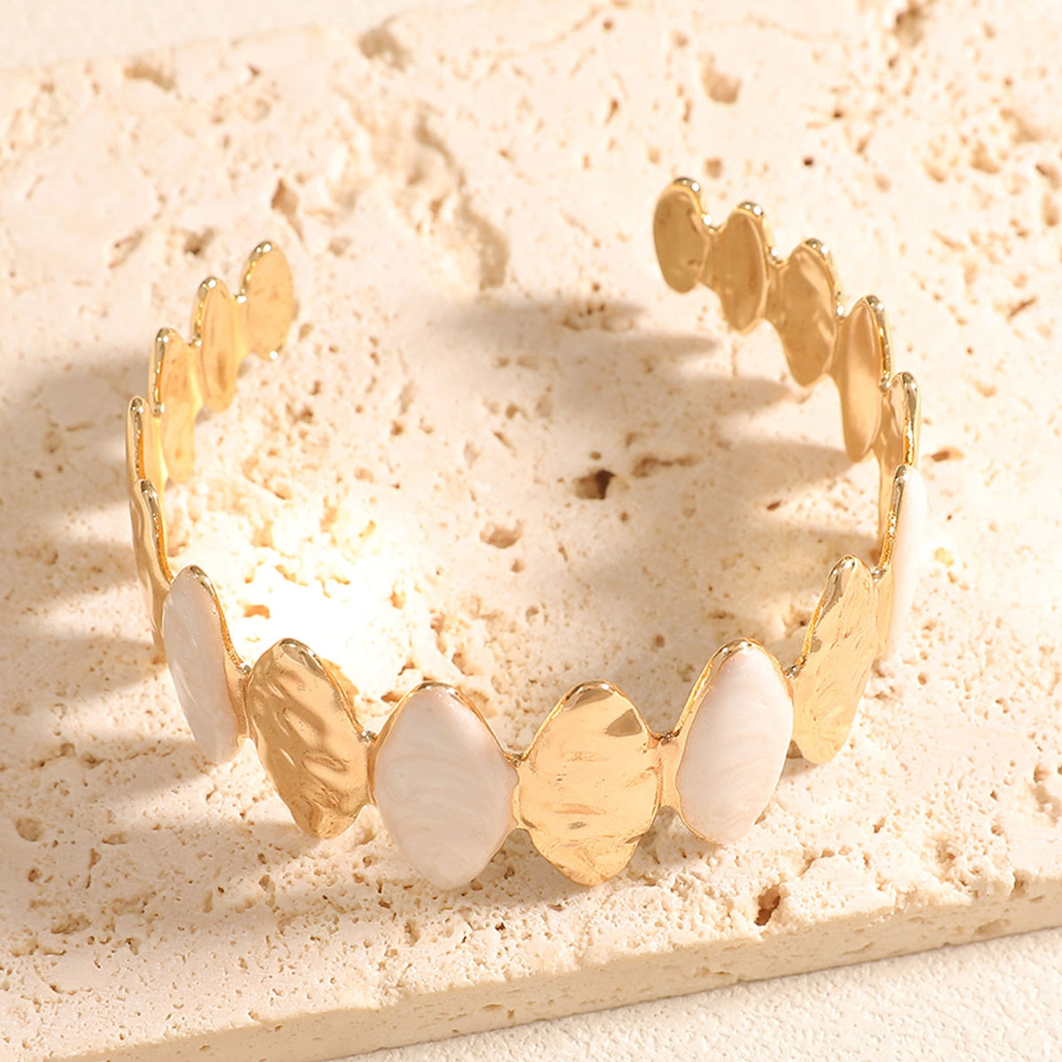 Ladies Open Bangle made of noble metal with elegant motif