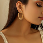 Ladies hoop earrings with intricate structures