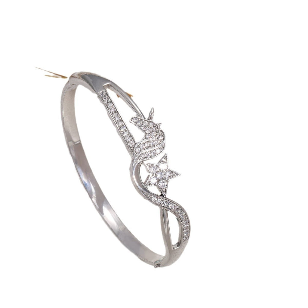 Women's bangle with elegant infinity pattern and sparkling zirconia