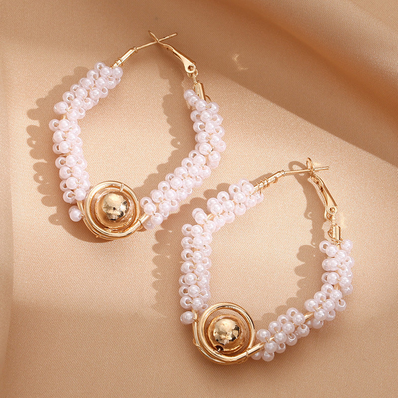 Women’s hoops with artistic pearl design