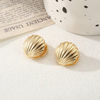 Women's ear clips in elegant shell design