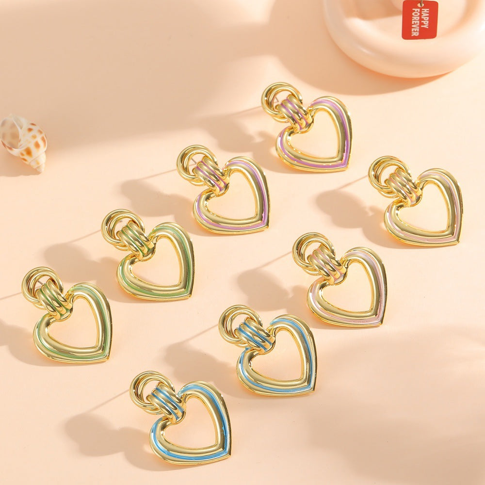 Women’s earrings in modern heart design