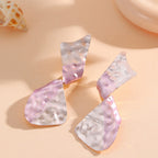 Ladies earrings in modern disc design