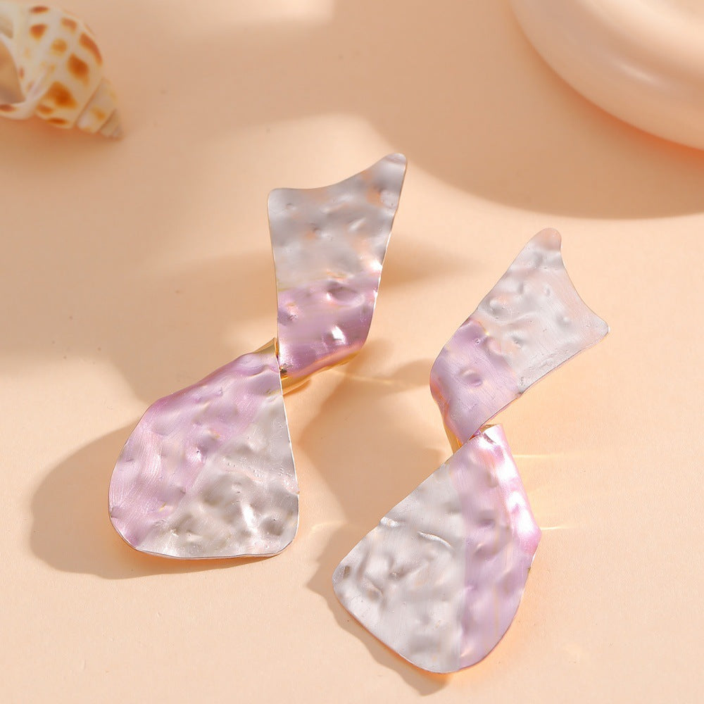 Ladies earrings in modern disc design