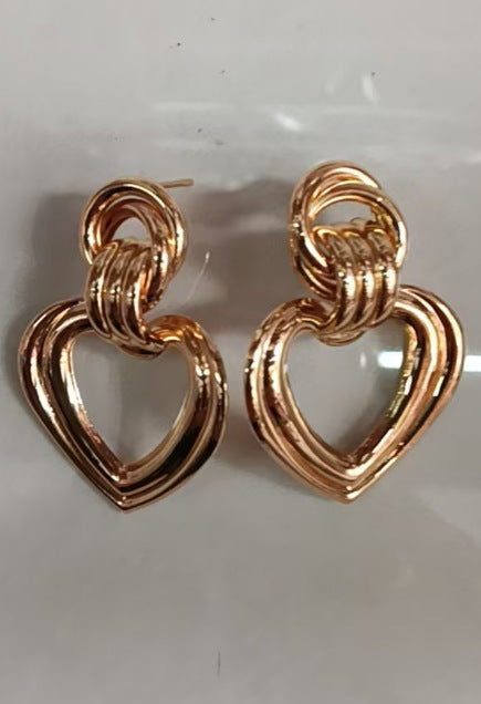 Women’s earrings in modern heart design