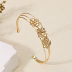 Women's cuff bracelet with artistic leaf motif