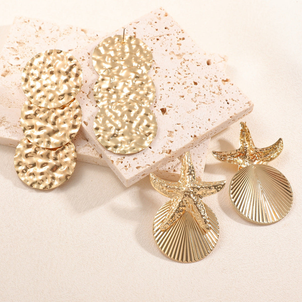 Women's ear clips in luxurious shell and starfish design