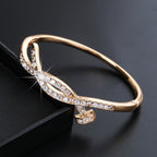 Women's bangle with elegant infinity pattern and sparkling zirconia