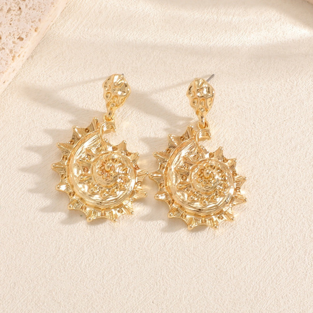Ladies earrings in shell design