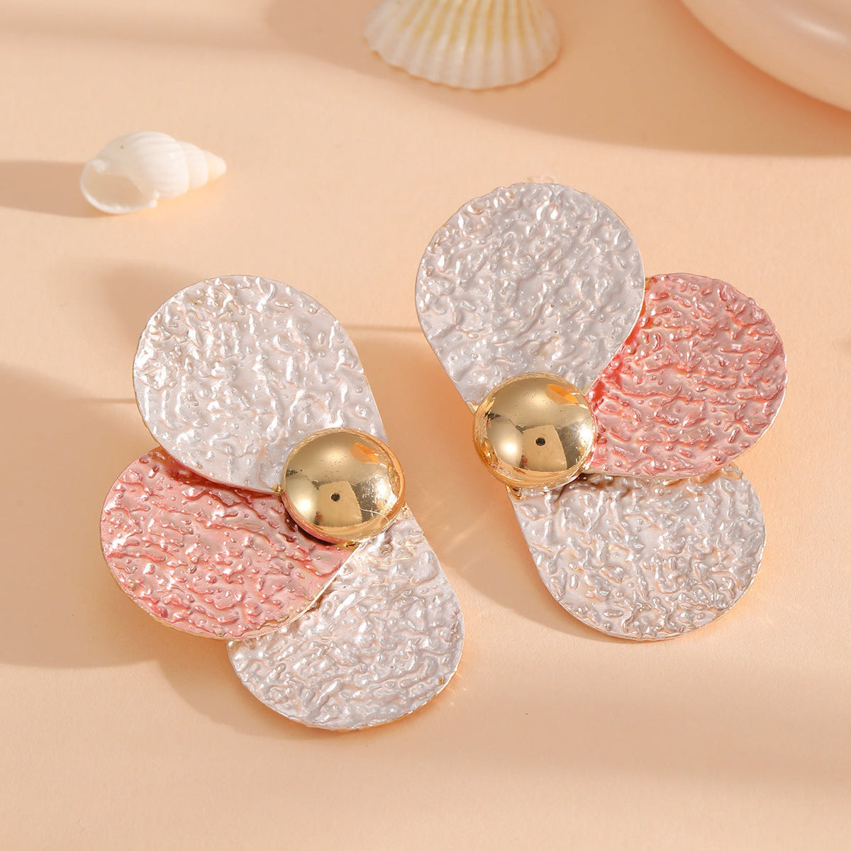 Women's ear clips in elaborate floral pattern