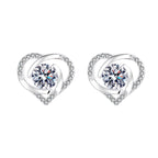 Ladies earrings in elegant heart design with shimmering zirconia