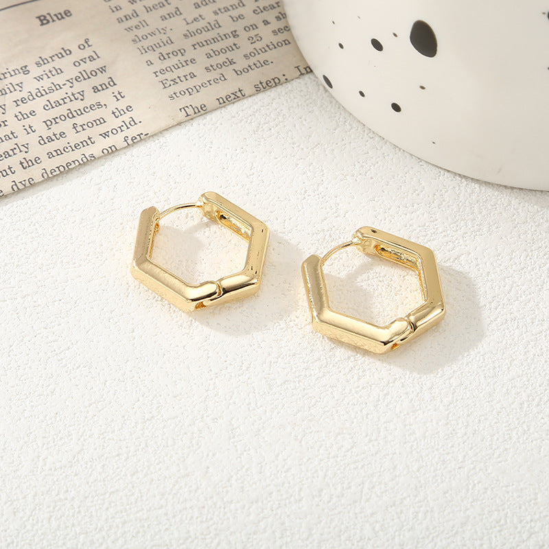 Women's hoop earrings with modern, textured design