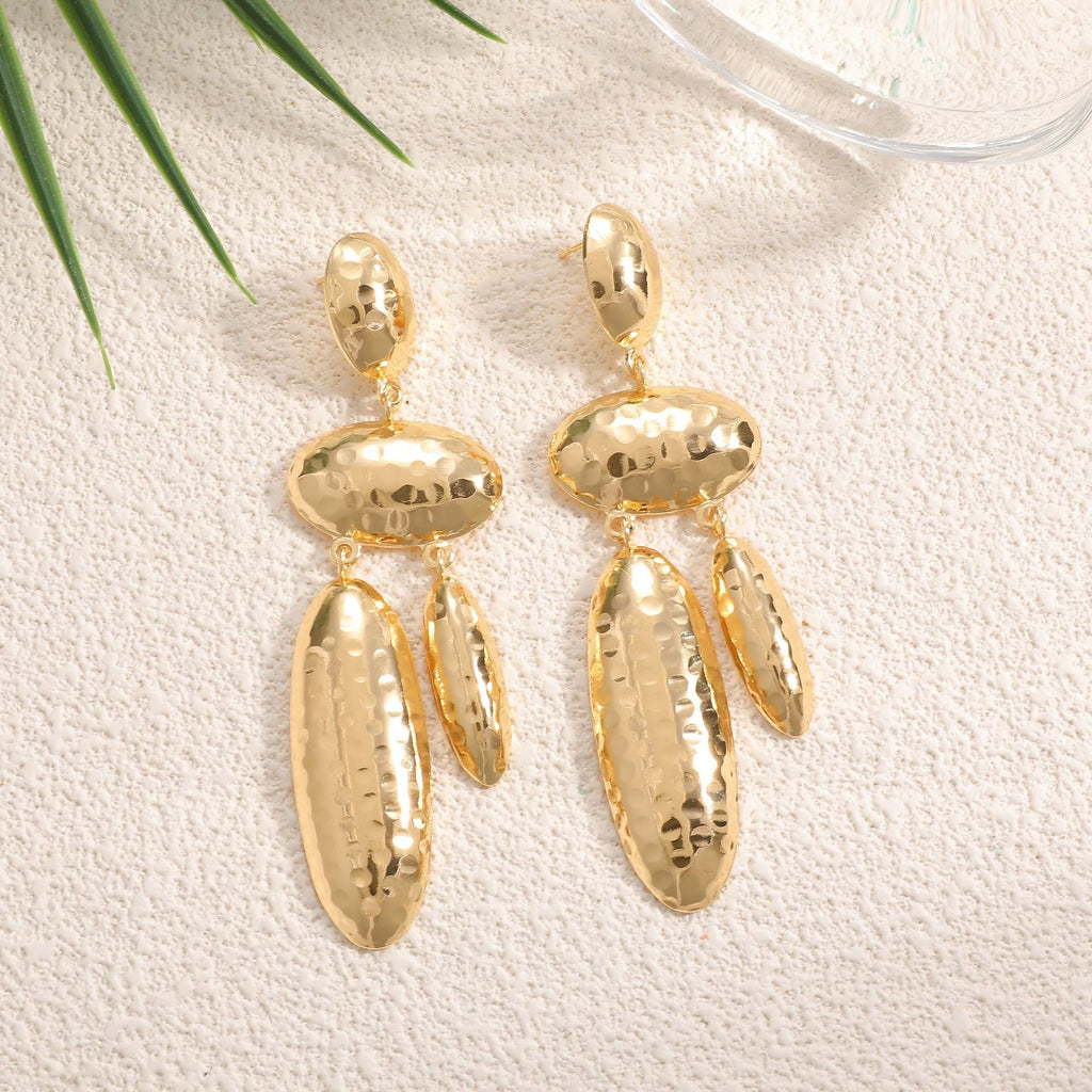 Women Hanging Earrings with artistic, three-dimensional design