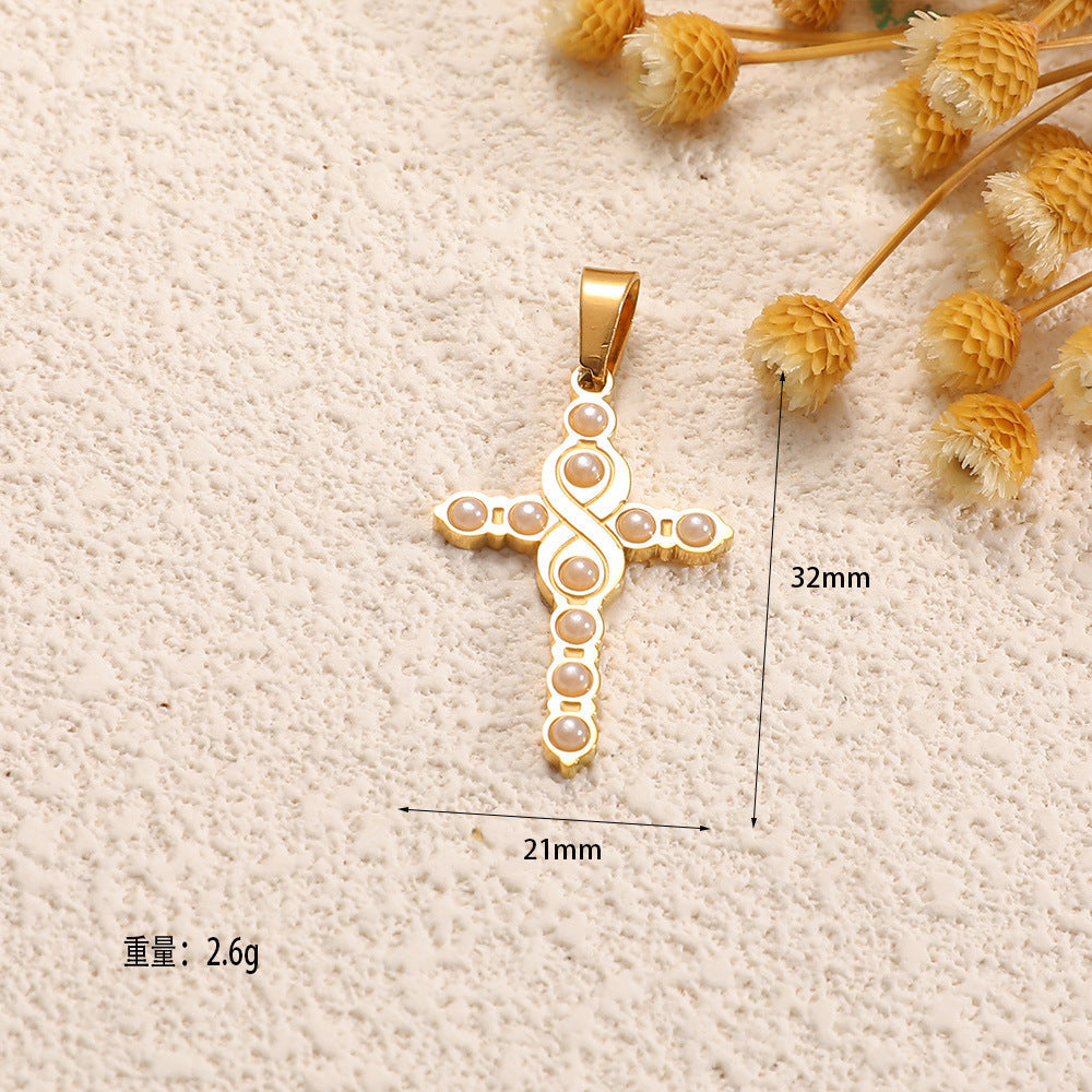 Ladies cross pendant with heart-shaped design and sparkling accents