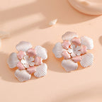 Ladies' flower earrings with intricate design and glossy accents