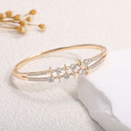 Ladies bracelet with elaborate infinity symbol and sparkling zirconia