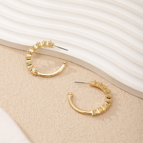 Ladies hoop earrings with intricate structures