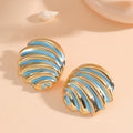 Women's ear clips in maritime shell design