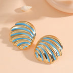 Women's ear clips in maritime shell design