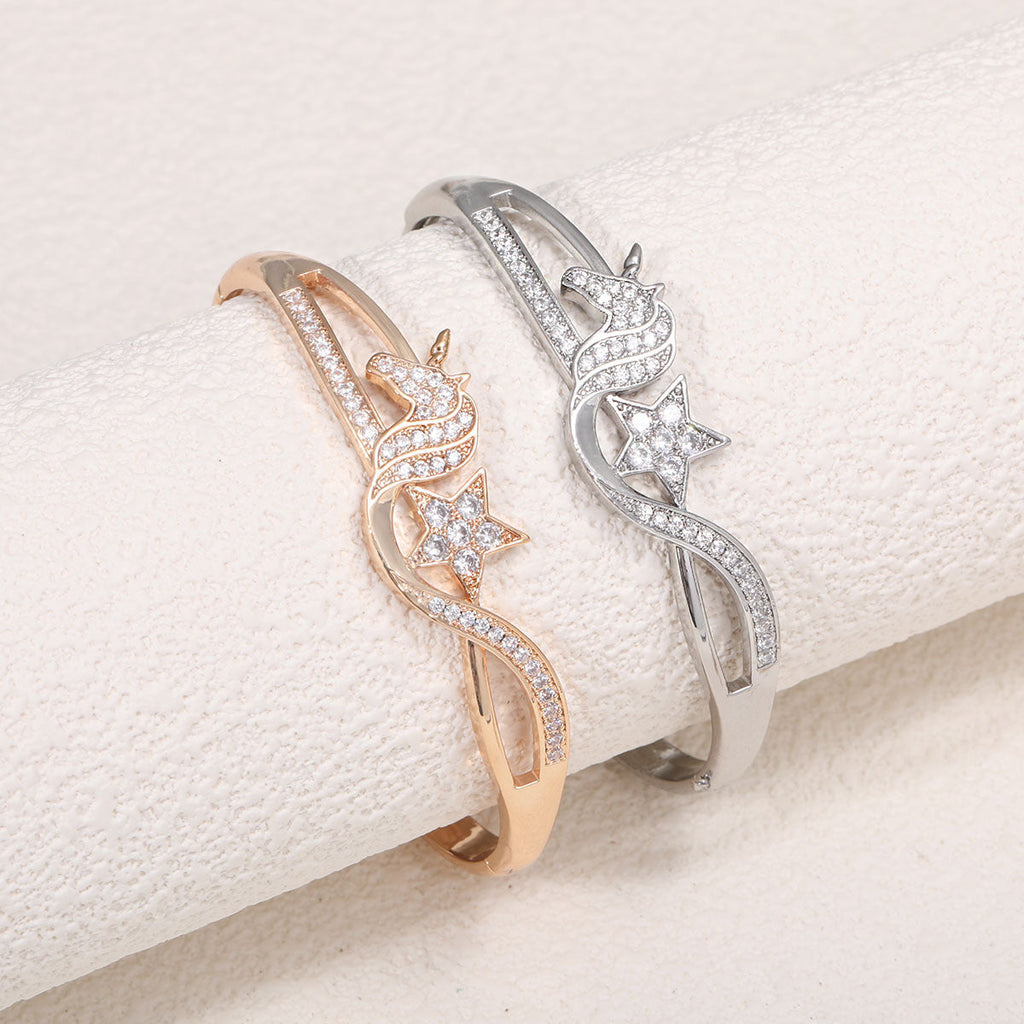 Ladies bracelet with elaborate infinity symbol and sparkling zirconia