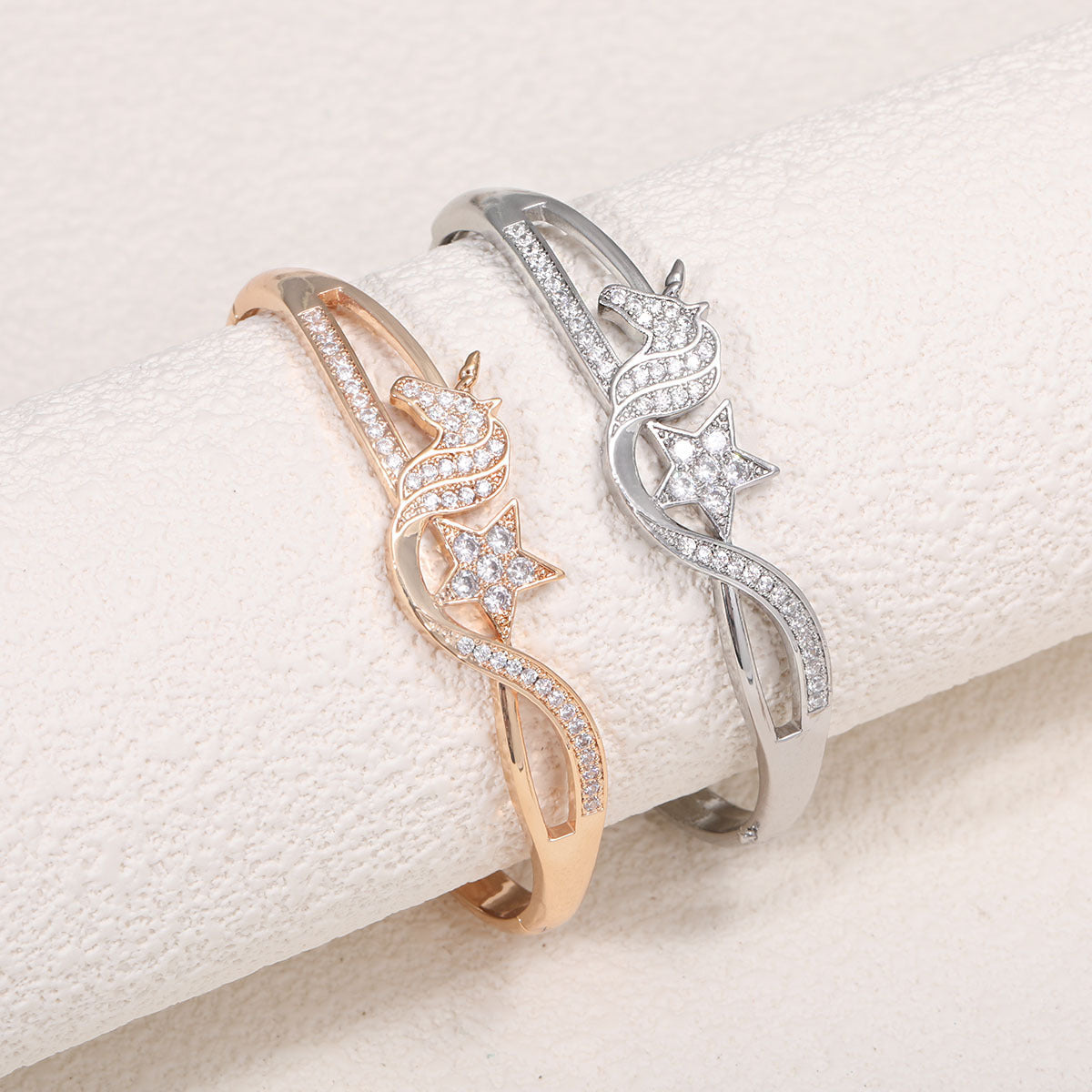 Ladies bracelet with elaborate infinity symbol and sparkling zirconia