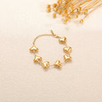 Ladies' bracelet with elegant heart design and fine link chain