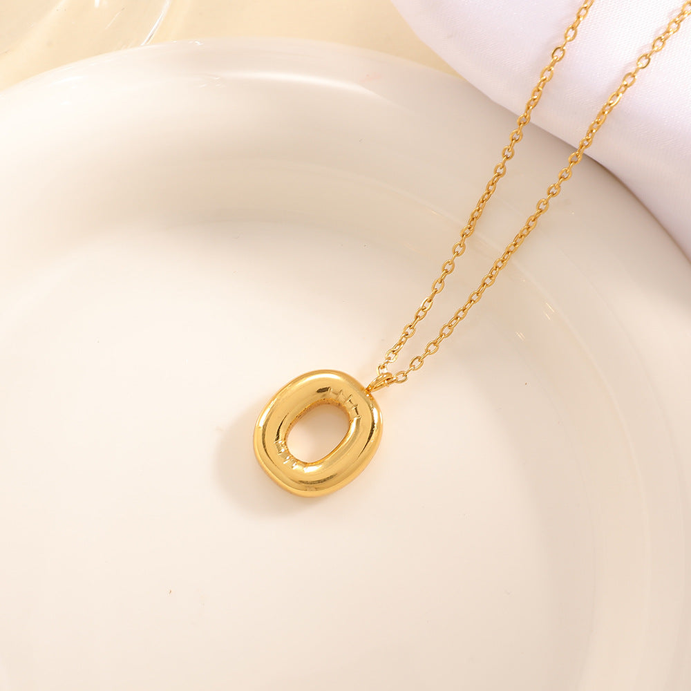 Women's necklace with curved letter pendant