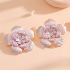 Ladies' flower earrings with intricate design and glossy accents